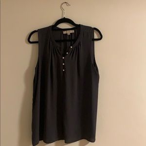 Dark gray sleeveless blouse with pearl buttons